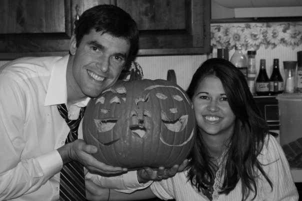 Joey and Maegan carve a pumpkin with three faces to announce their pregnancy that fall. 
