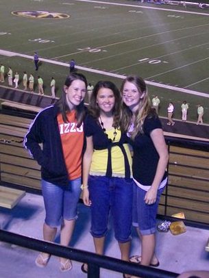 Three sisters attend football game