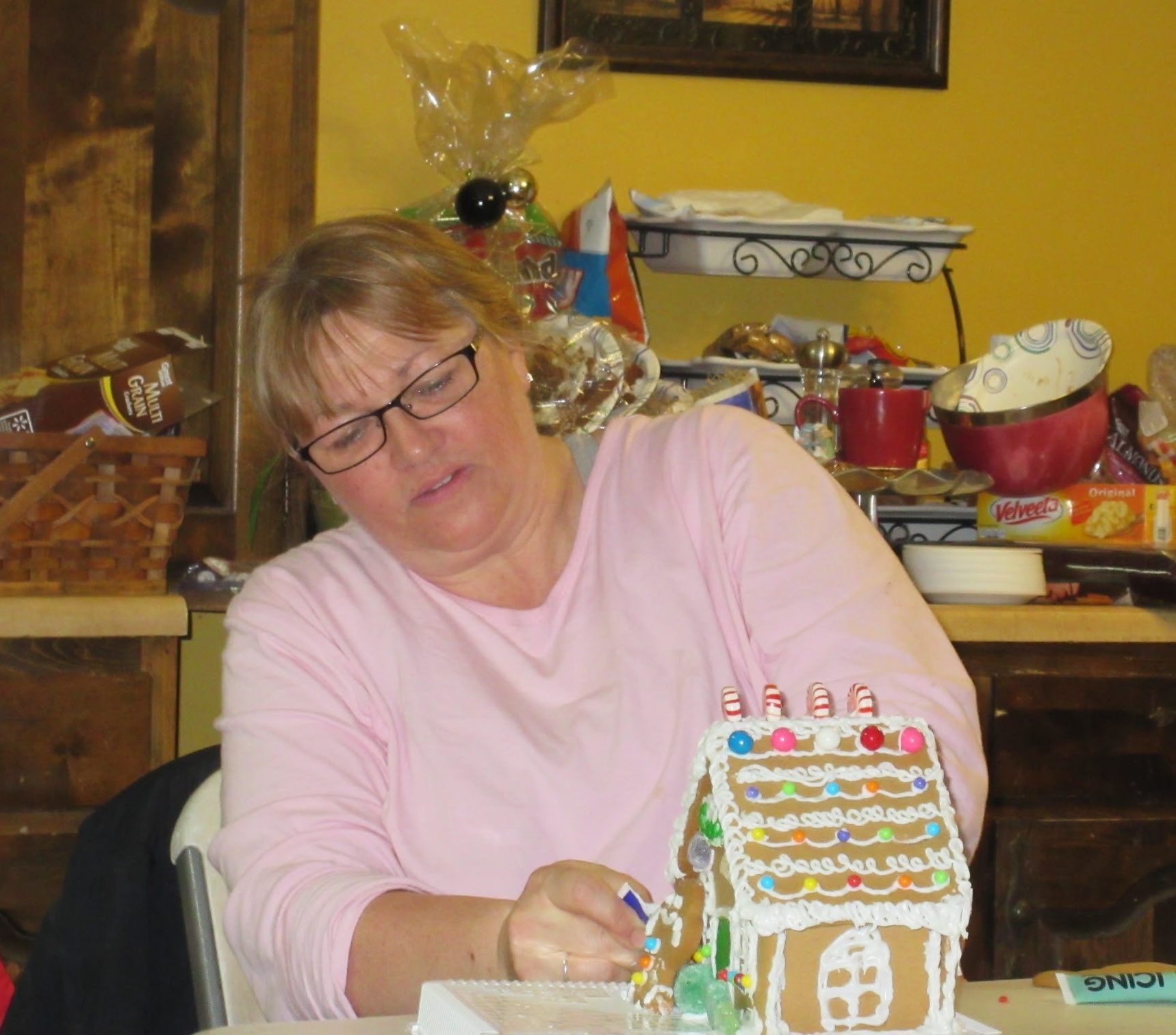 Cool grandma doing gingerbread houses