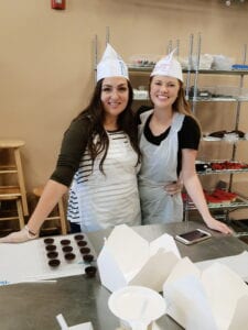 Tara and Makayla in their chocolatier garb at Just Add Chocolate