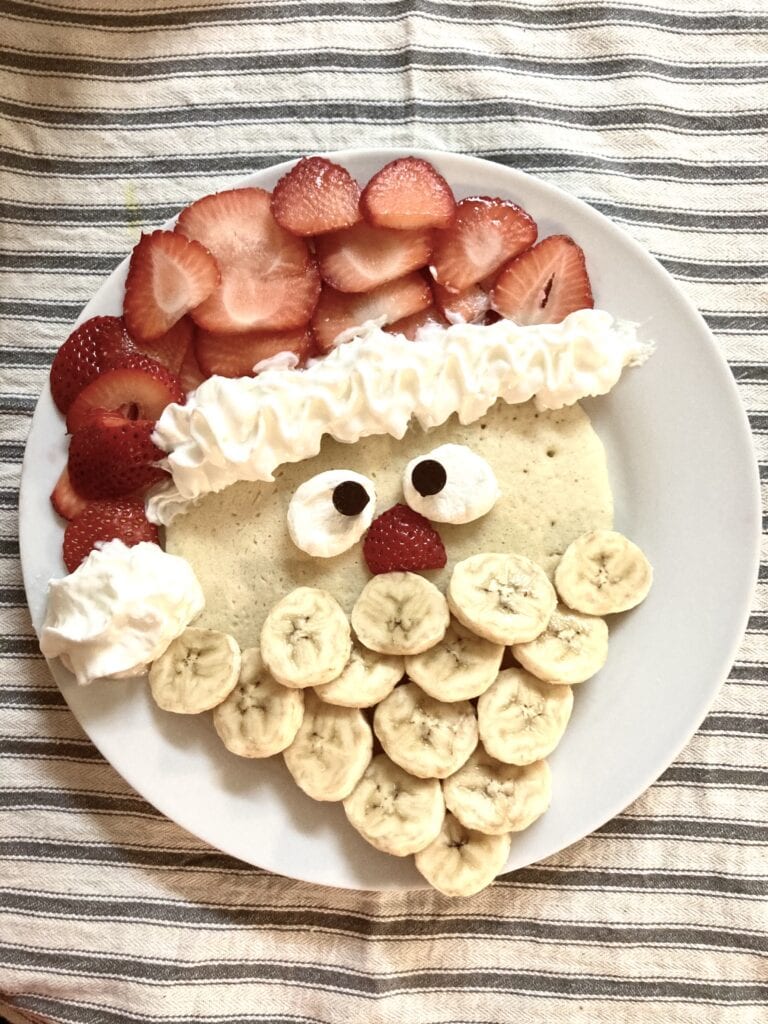 Pancake decorated to look like Santa