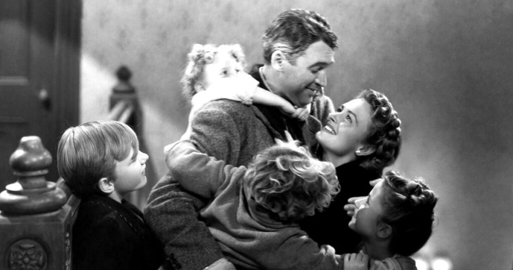 In the movie, It's a Wonderful Life, a man hugs his wife and four children in a classic movie